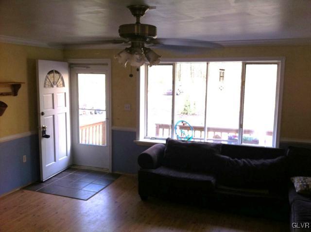 508 Westbrook Road Effort, PA 18330 - Photo 20 of 49 a living room with furniture and a large window
