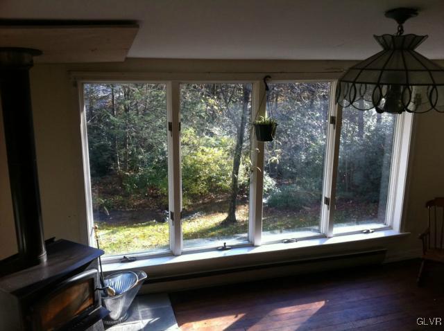 508 Westbrook Road Effort, PA 18330 - Photo 23 of 49 a room with a large window and a table