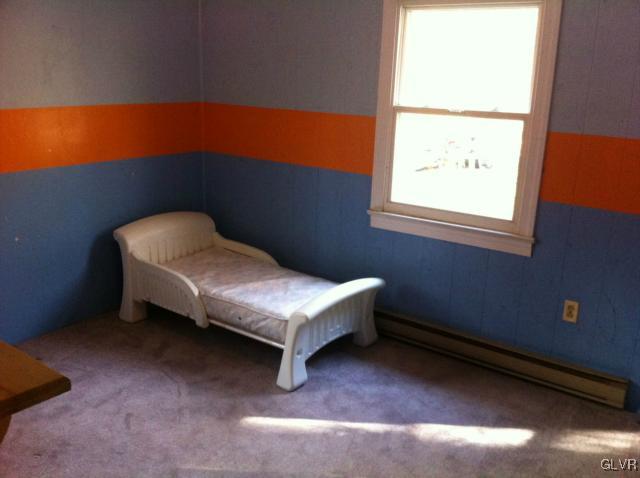 508 Westbrook Road Effort, PA 18330 - Photo 33 of 49 a room with a chair and a window