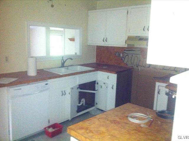 508 Westbrook Road Effort, PA 18330 - Photo 49 of 49 a kitchen with a sink and cabinets