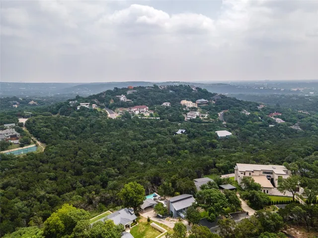 an aerial view of a city with lots of residential buildings