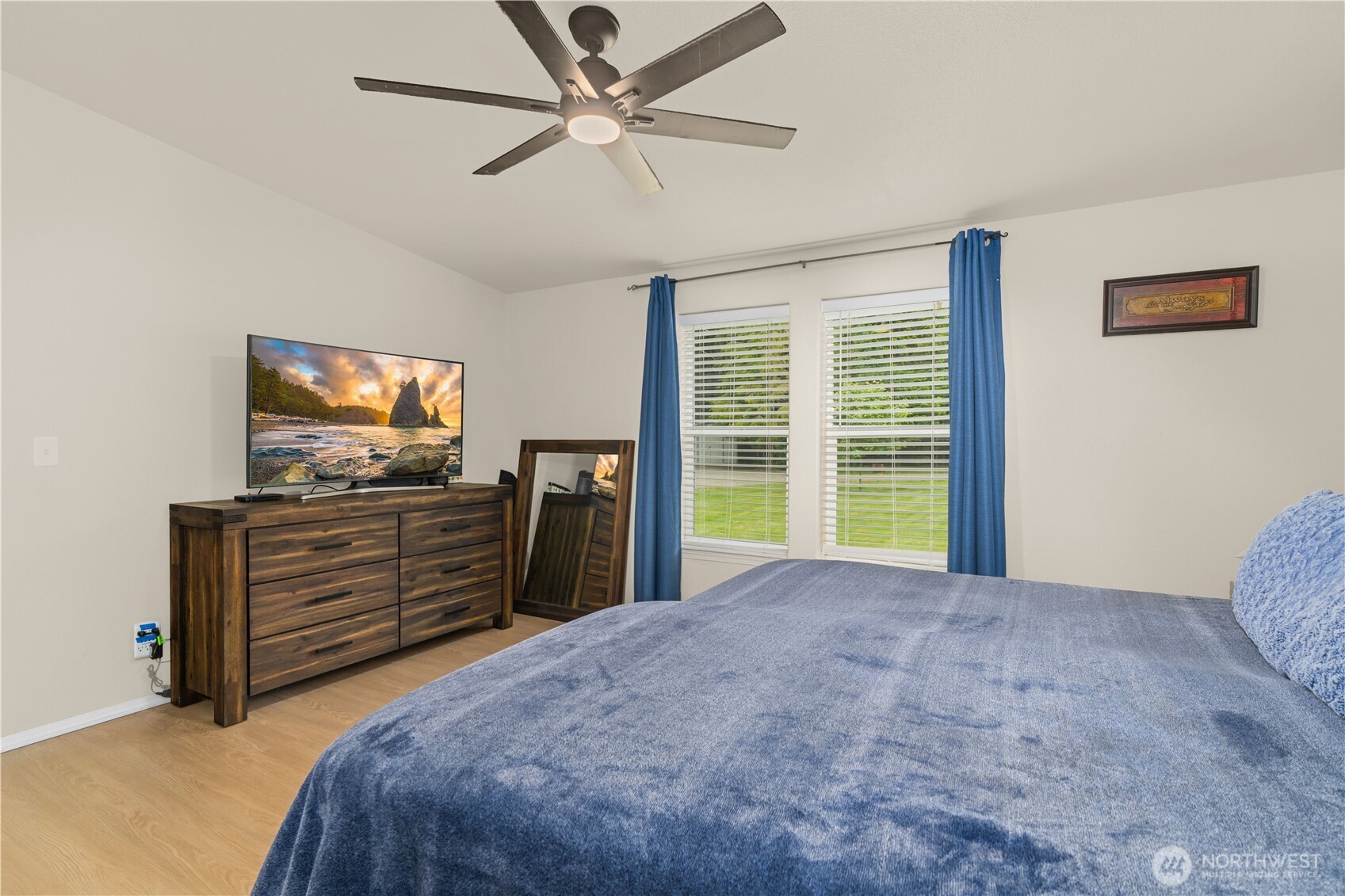 132 River Park Road Forks, WA 98331 - Photo 17 of 40 a bedroom with a bed and a flat screen tv