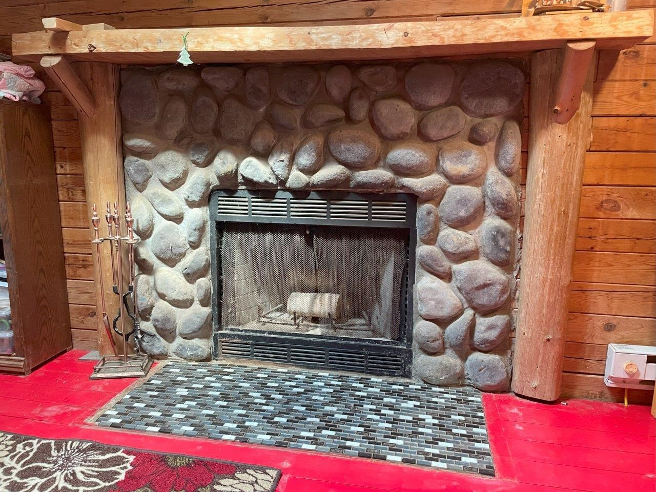 3420 Dewees Road Babbitt, MN 55706 - Photo 14 of 58 Natural stone, wood burning fireplace.