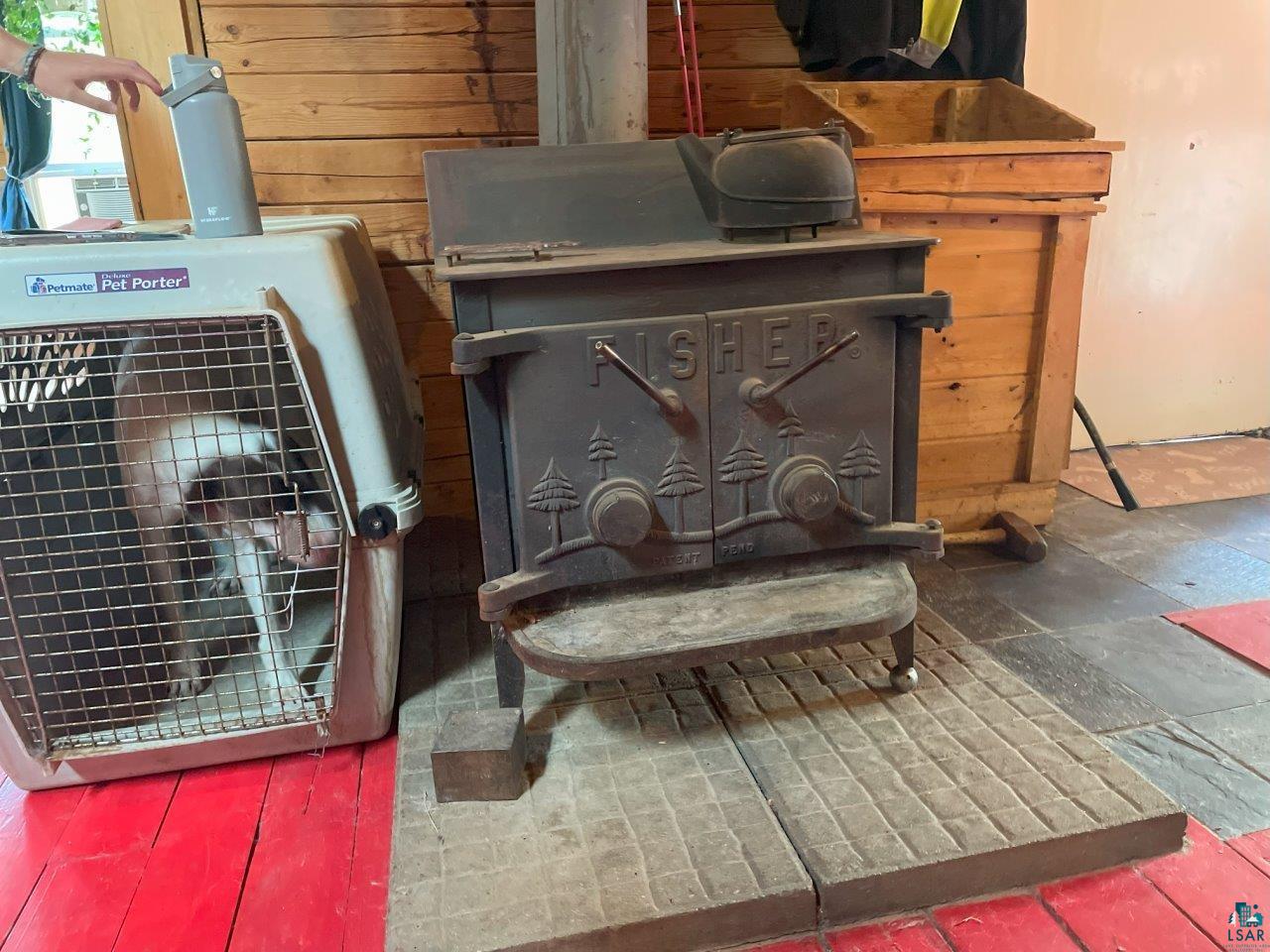 3420 Dewees Road Babbitt, MN 55706 - Photo 16 of 58 Freestanding, Fisher wood burning stove provides efficient heat.