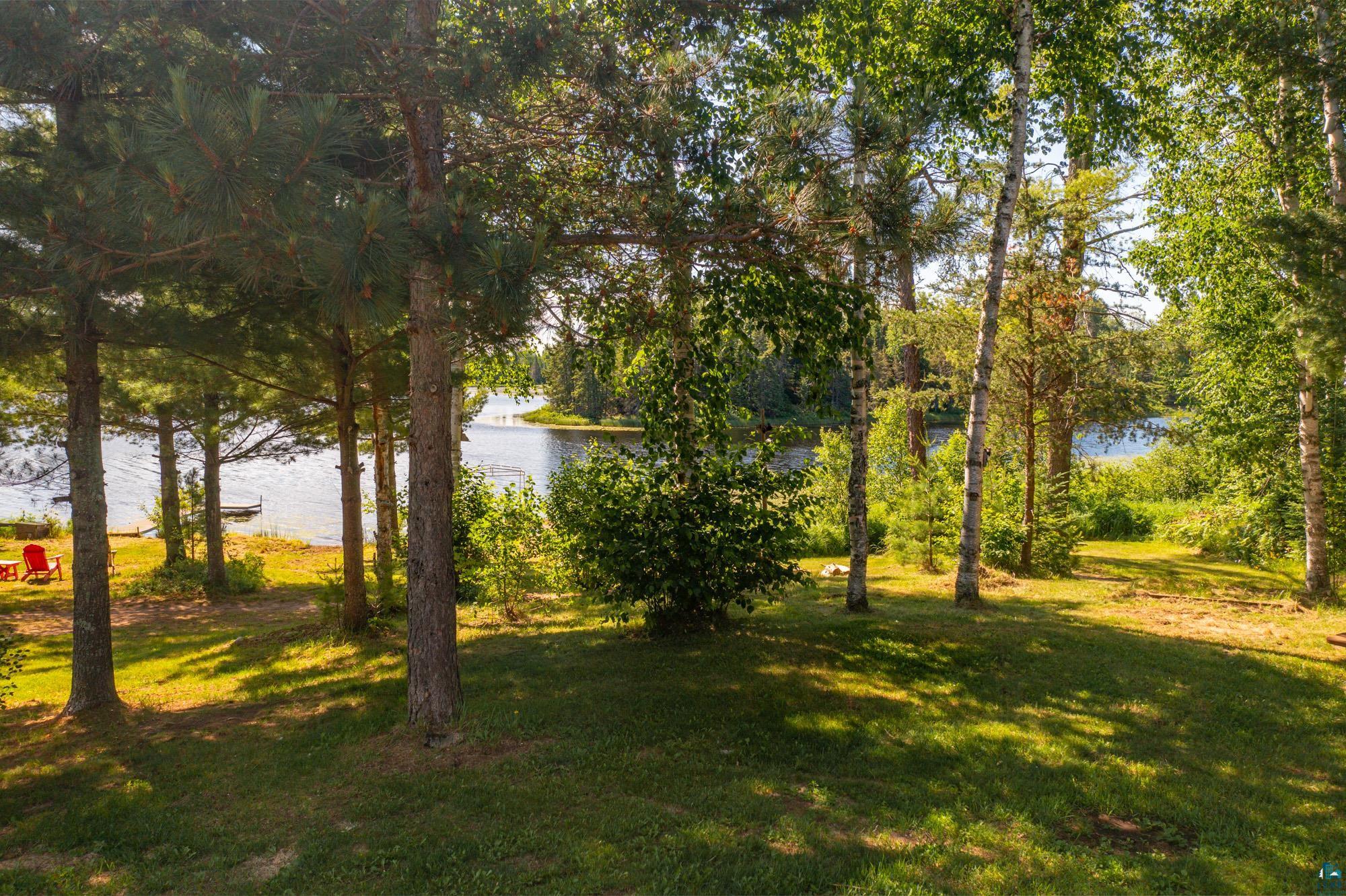 3420 Dewees Road Babbitt, MN 55706 - Photo 7 of 58 Yard with its tranquil lake view.