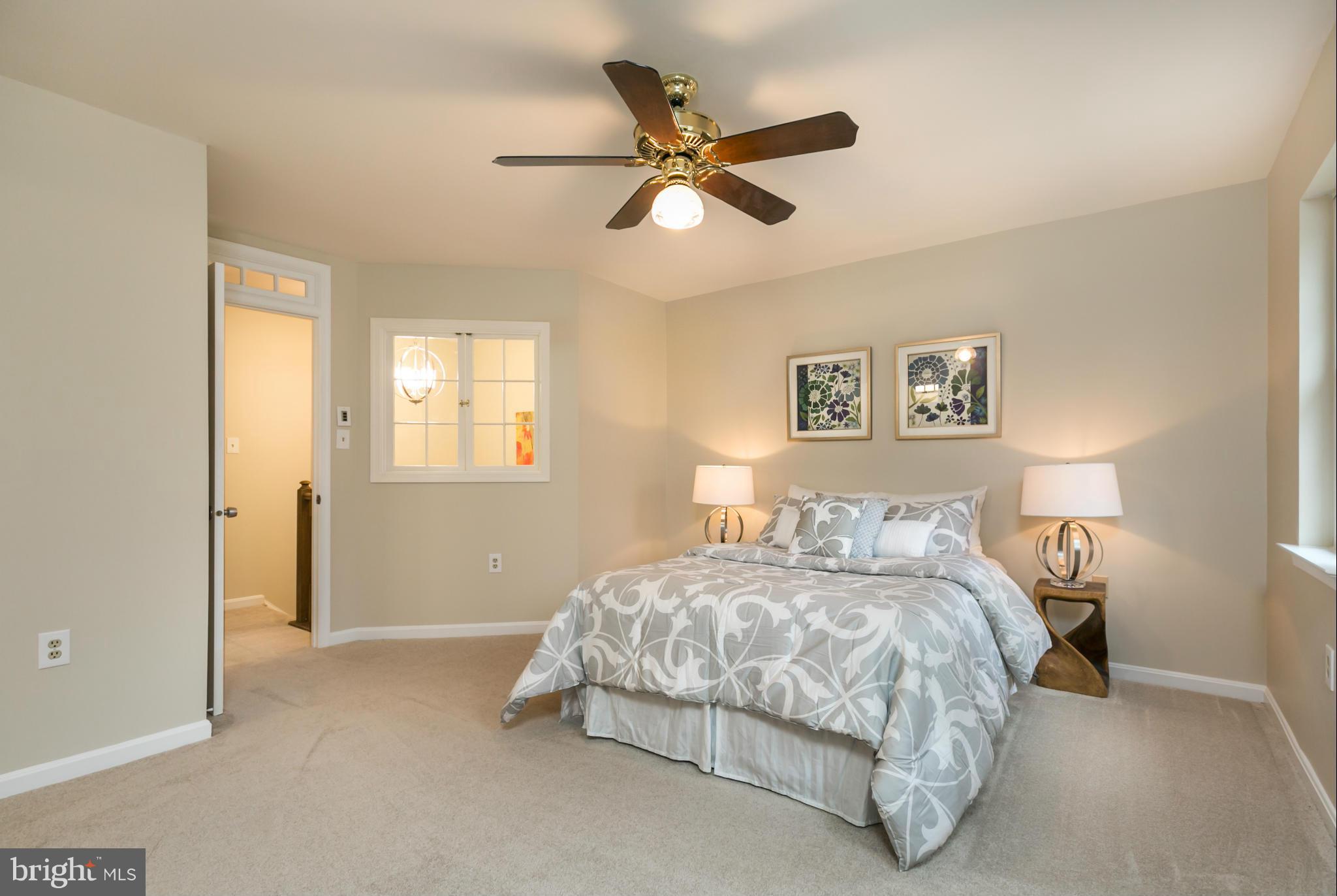 11974 Sentinel Point Court Reston, VA 20191 - Photo 13 of 26 a bedroom with a bed and window