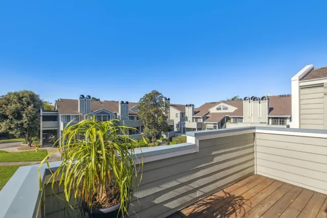 a view of a balcony with an outdoor space