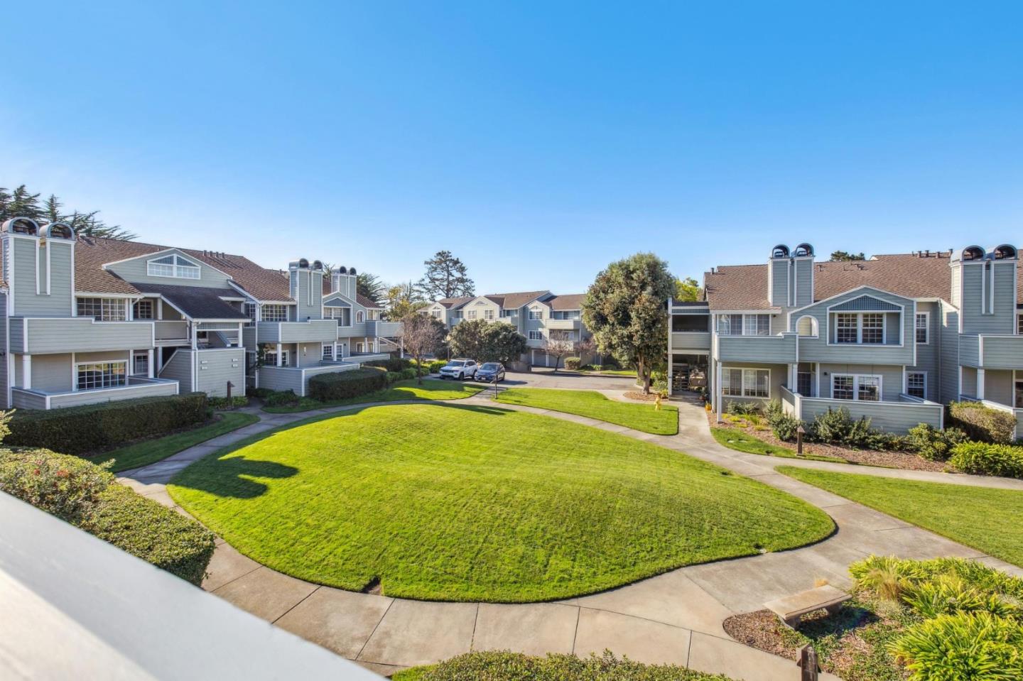 175 Troon Way Half Moon Bay, CA 94019 - Photo 14 of 49 a view of a swimming pool with a yard and plants