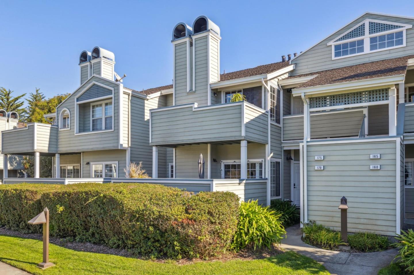 175 Troon Way Half Moon Bay, CA 94019 - Photo 2 of 49 a front view of a house with garden