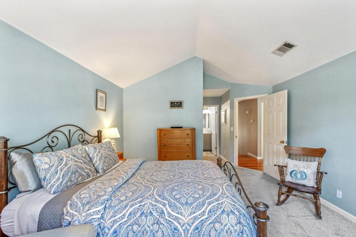 175 Troon Way Half Moon Bay, CA 94019 - Photo 29 of 49 a bedroom with a large bed and a window