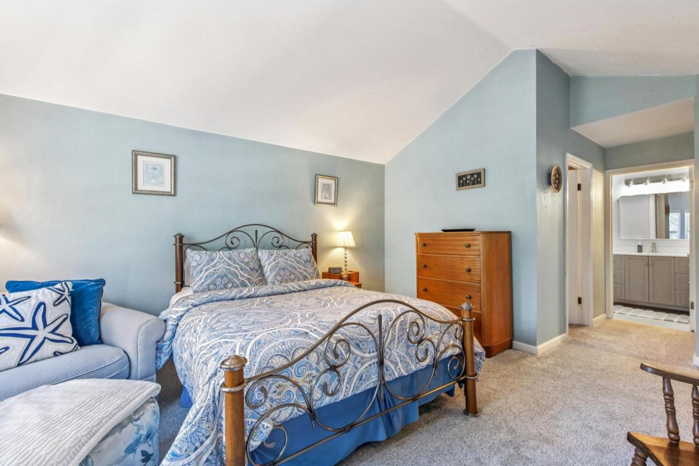 175 Troon Way Half Moon Bay, CA 94019 - Photo 30 of 49 a bedroom with a bed and a couch