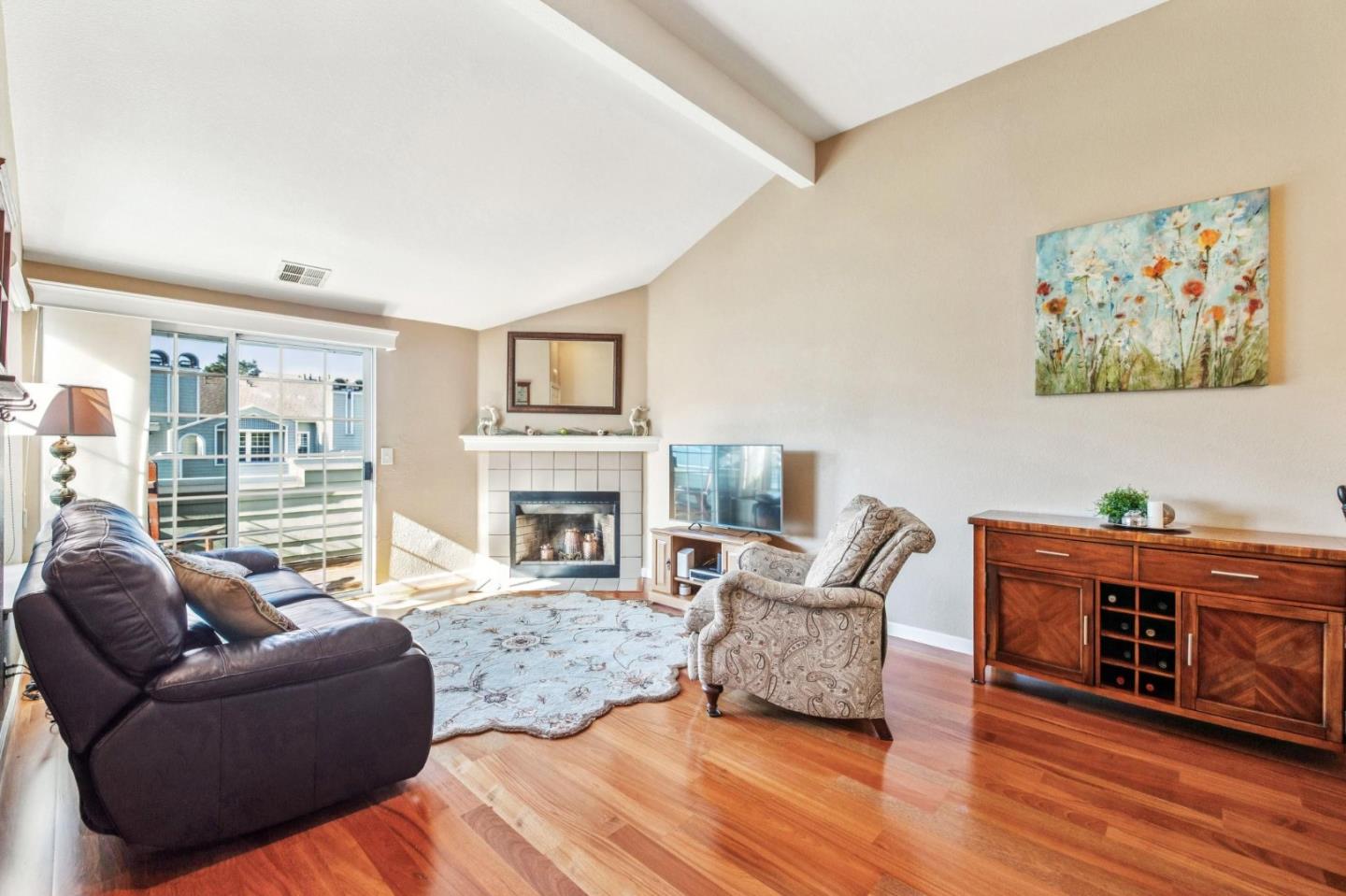 175 Troon Way Half Moon Bay, CA 94019 - Photo 6 of 49 a living room with furniture a fireplace and a large window