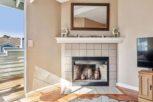 a bathroom with a fireplace and a sink