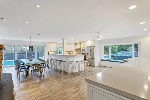 a bedroom with a bed and a table