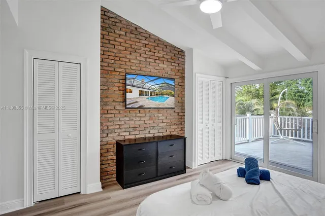 a view of a dining room with furniture and window