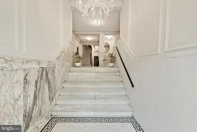 wooden floor with a bathroom