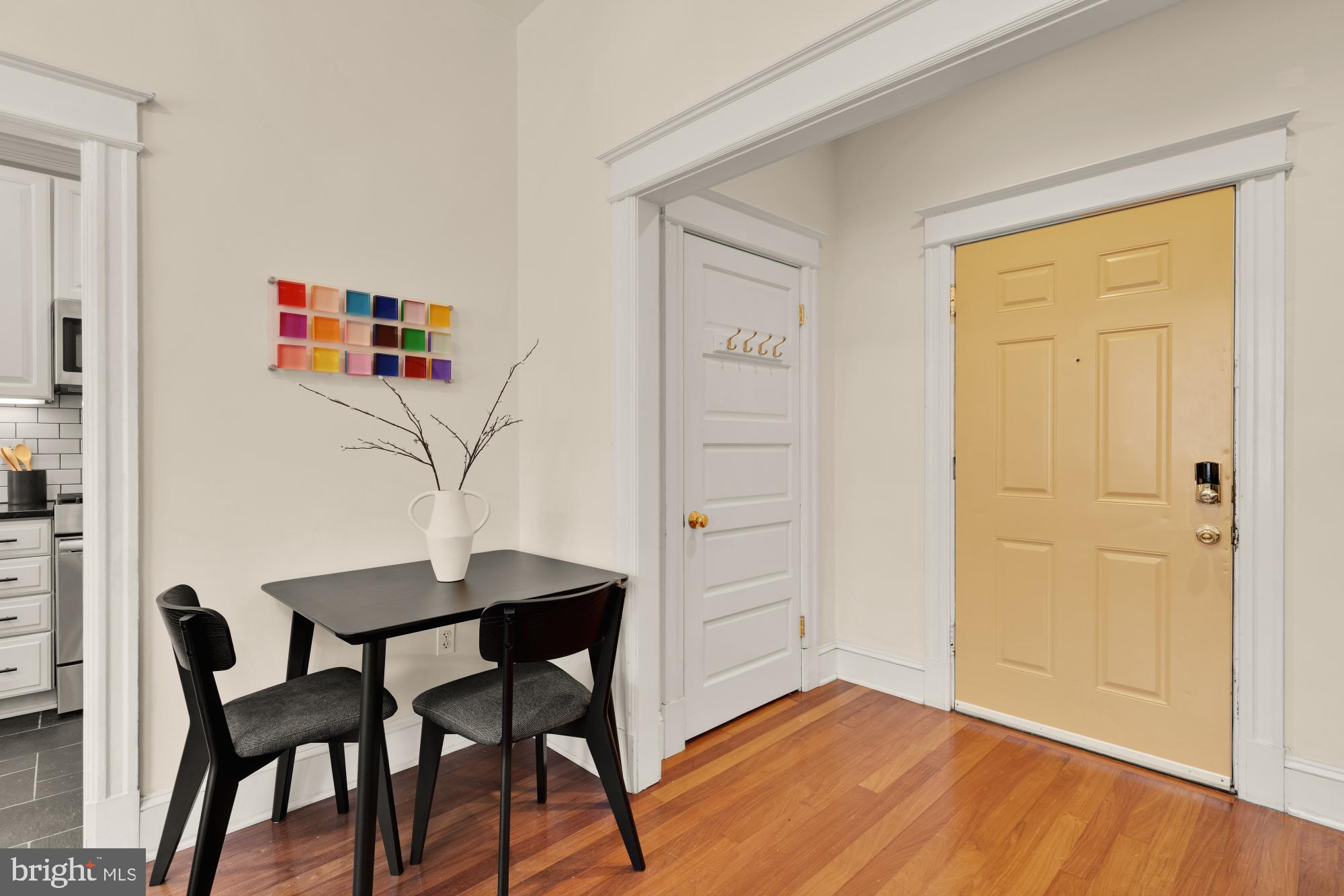 1833 S Street Northwest, Unit 2 Washington, DC 20009 - Photo 3 of 29 a workspace with furniture and wooden floor