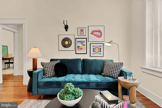 a living room with furniture and rug