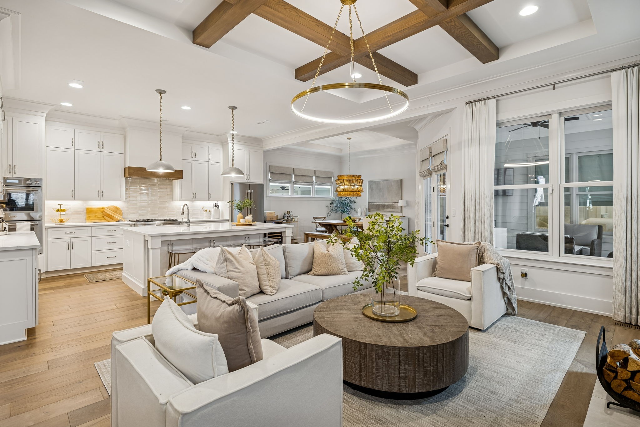 1013 William Street Franklin, TN 37064 - Photo 11 of 57 a living room with furniture kitchen and a chandelier