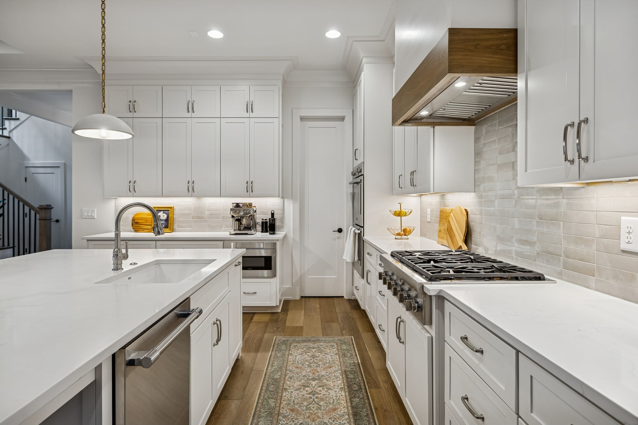 1013 William Street Franklin, TN 37064 - Photo 15 of 57 a kitchen with stainless steel appliances granite countertop a sink stove and cabinets