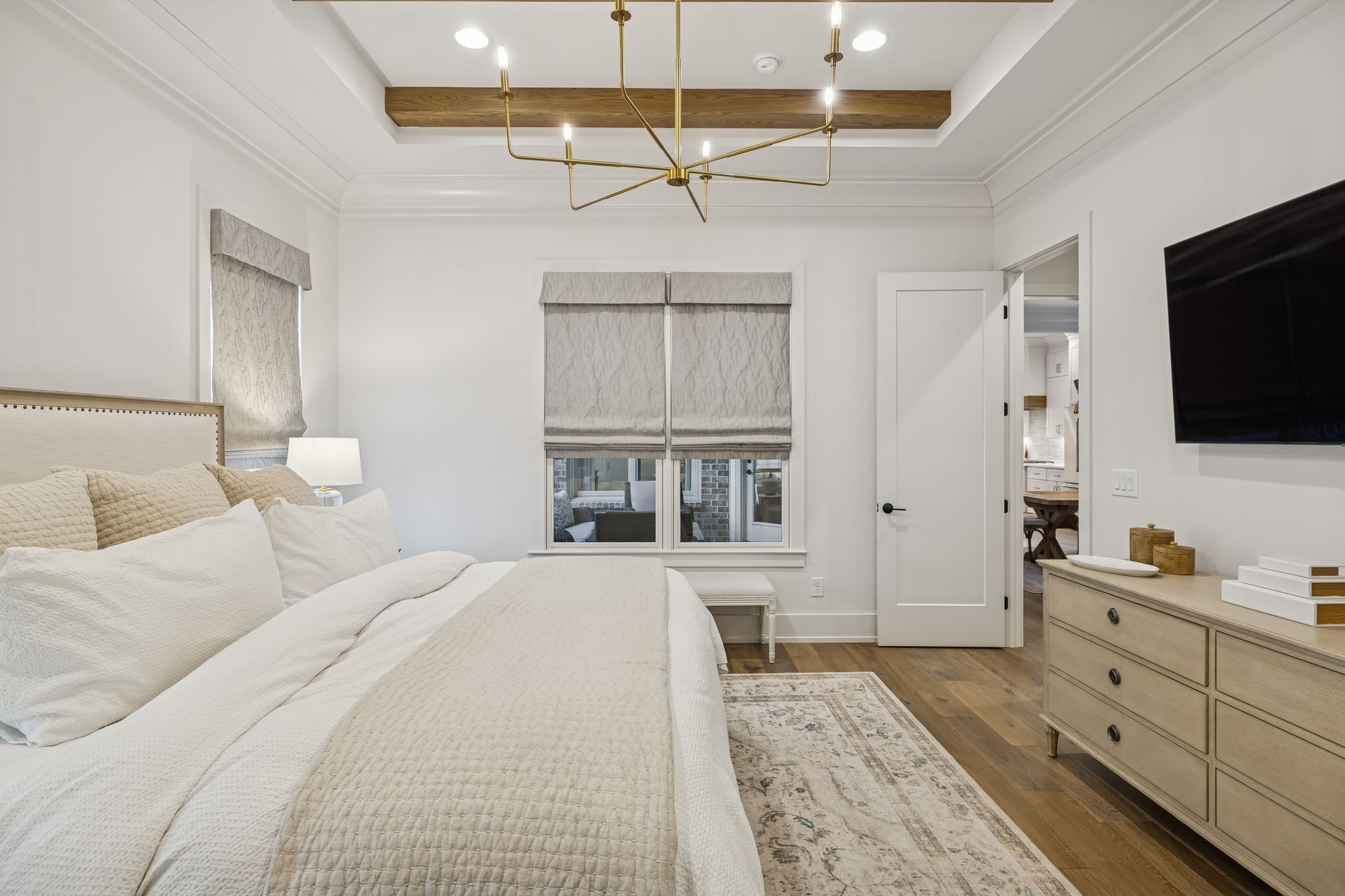 1013 William Street Franklin, TN 37064 - Photo 20 of 57 a bedroom with a bed and a flat screen tv