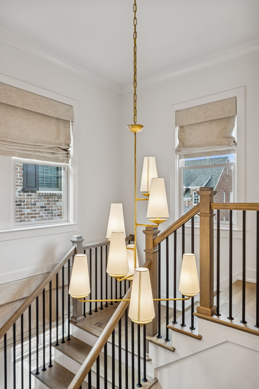 1013 William Street Franklin, TN 37064 - Photo 31 of 57 a view of staircase with lots of frames on wall and a large window