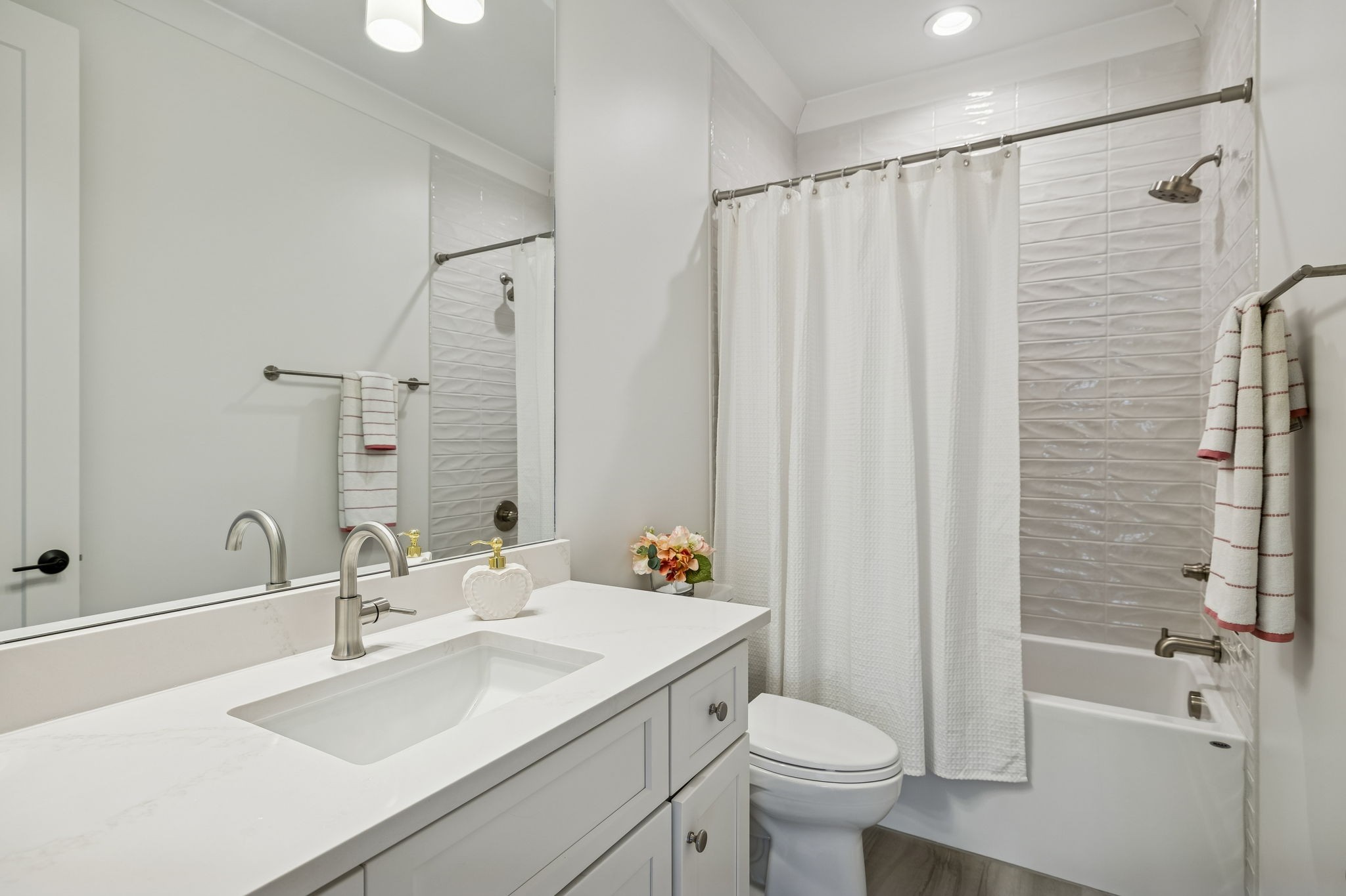 1013 William Street Franklin, TN 37064 - Photo 35 of 57 a bathroom with a sink toilet and shower