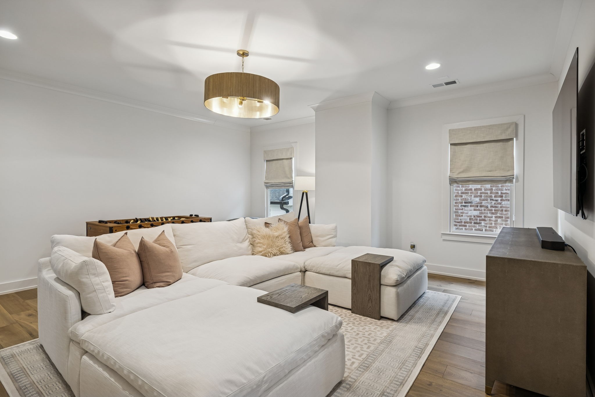 1013 William Street Franklin, TN 37064 - Photo 36 of 57 a living room with furniture a large window and a chandelier