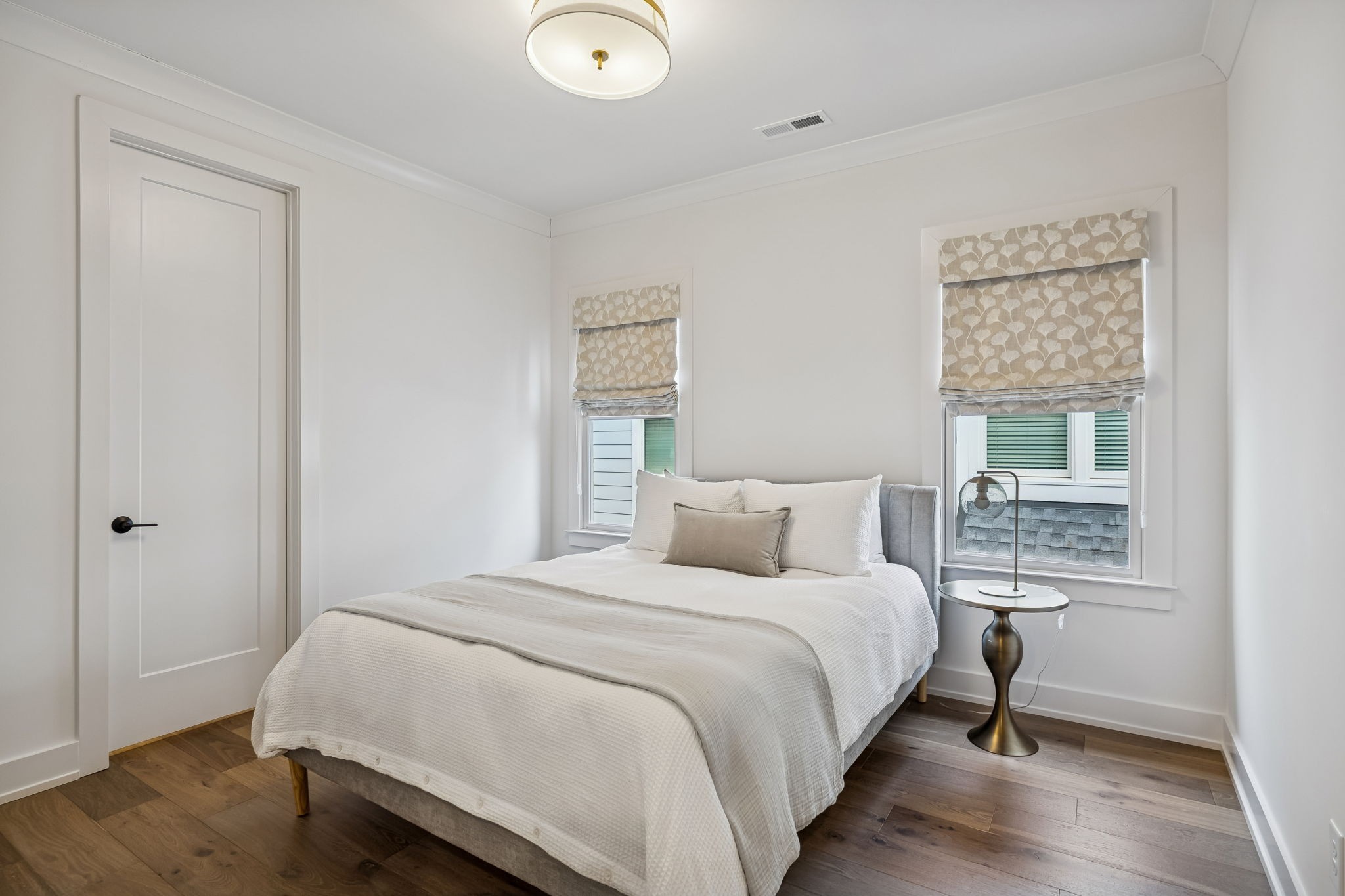 1013 William Street Franklin, TN 37064 - Photo 38 of 57 a bedroom with a bed and a night stand