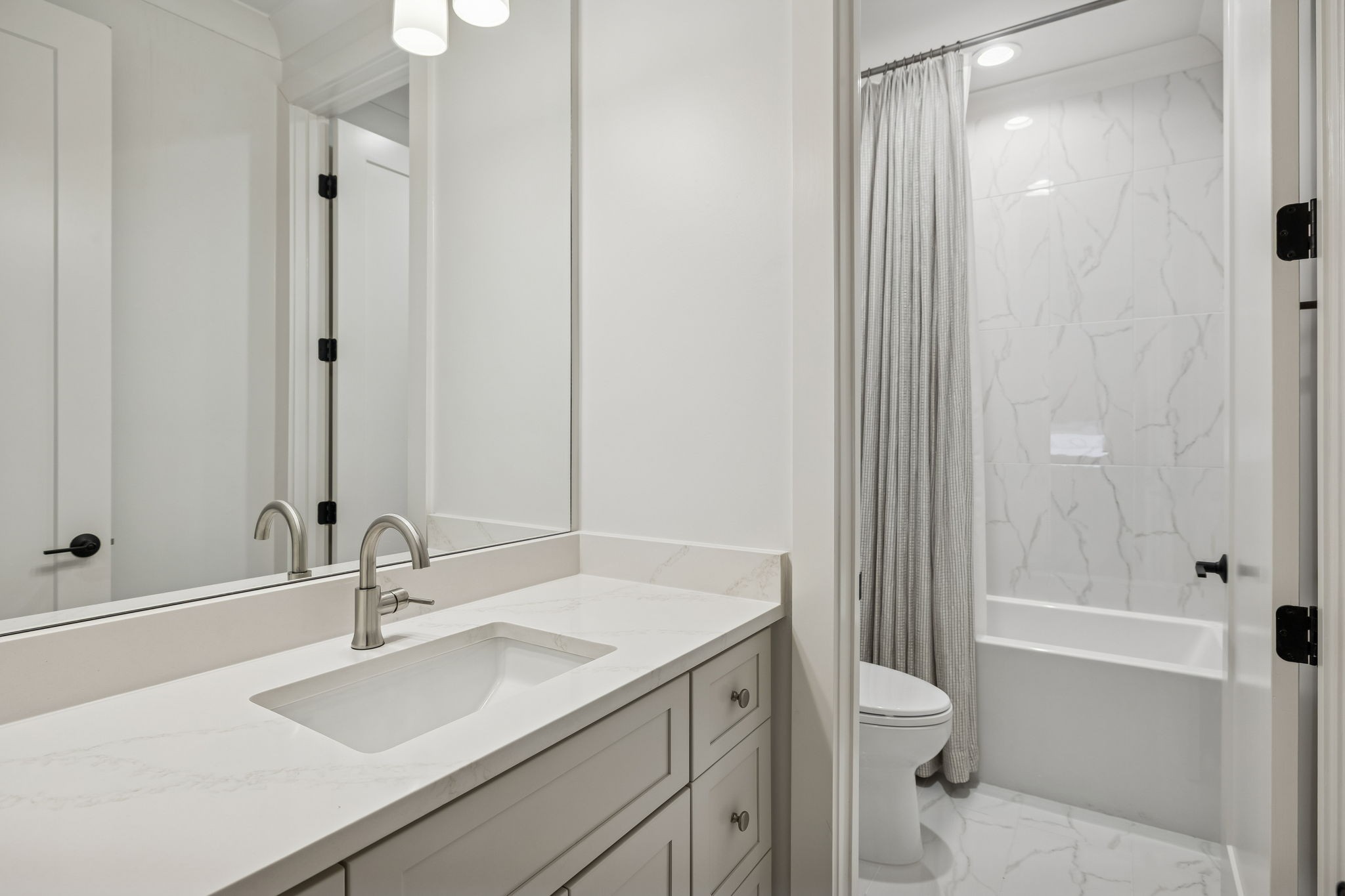 1013 William Street Franklin, TN 37064 - Photo 40 of 57 a bathroom with a sink a toilet and shower