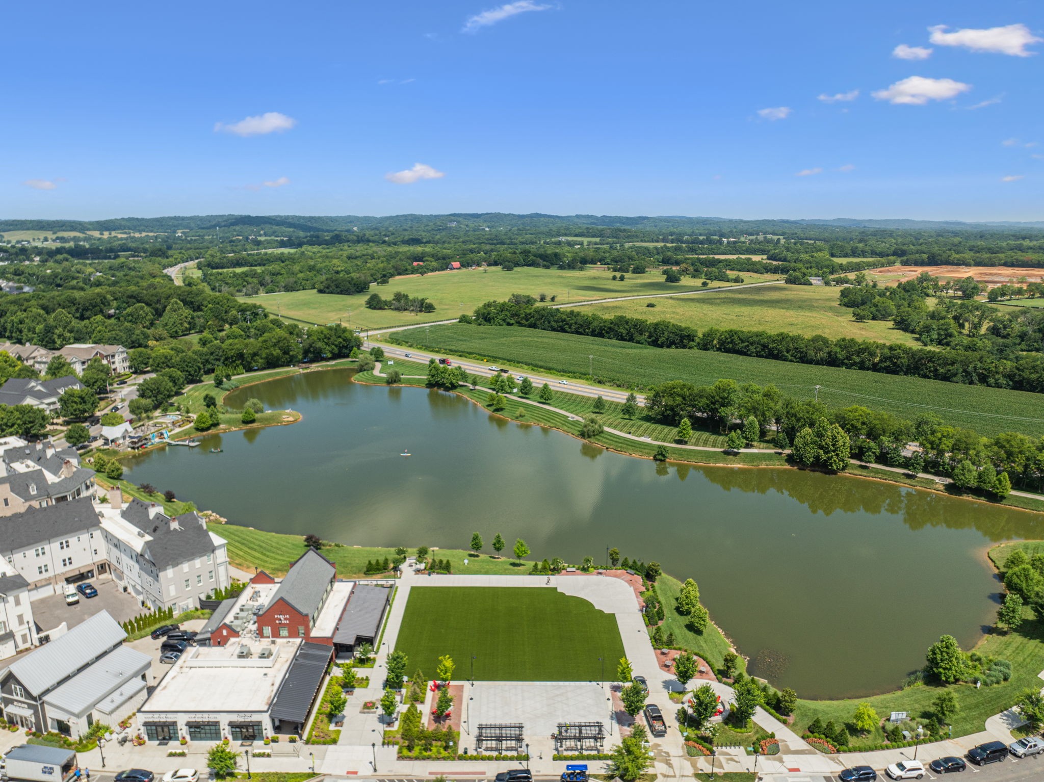 1013 William Street Franklin, TN 37064 - Photo 50 of 57 an aerial view of residential houses with outdoor space and lake view