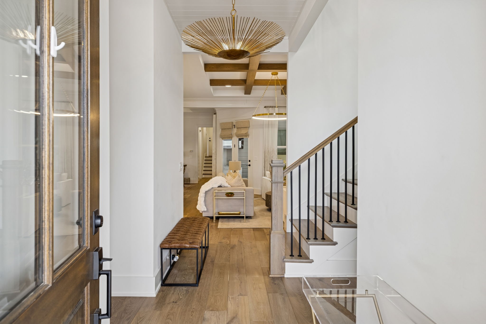 1013 William Street Franklin, TN 37064 - Photo 5 of 57 a view of a hallway with wooden floor and a livingroom