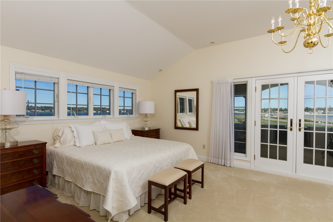 191 Old Beach Road Newport, RI 02840 - Photo 15 of 40 Master Suite- with waterviews from all windows and ocean balcony from French Doors.