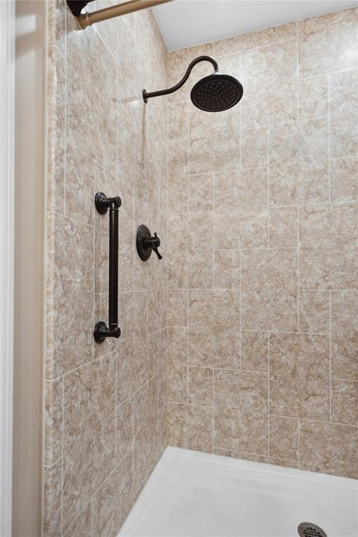 2101 Sunset Point Road, Unit 1102 Clearwater, FL 33765 - Photo 15 of 27 Primary bath has walk-in shower