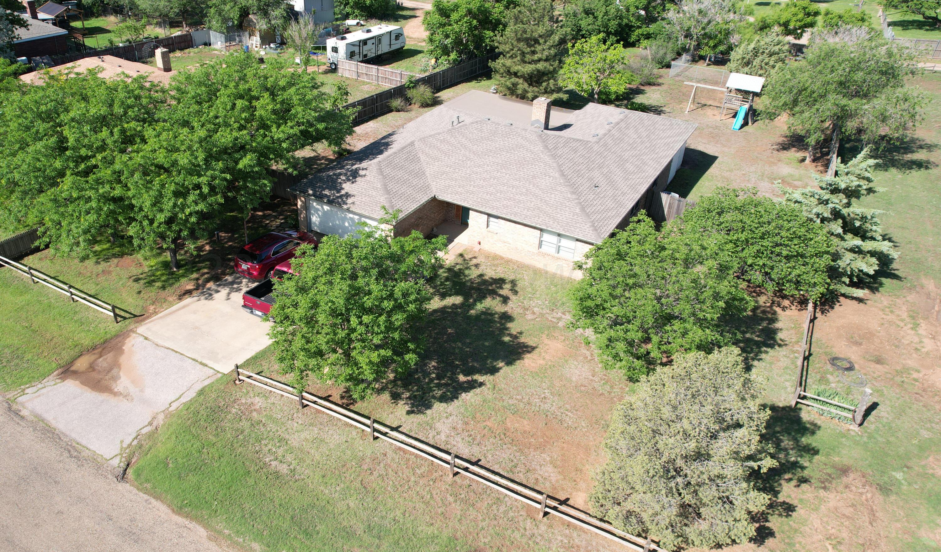 112 Rolling Trail Amarillo, TX 79108 - Photo 3 of 38 112RollingTrails-fronthouse-diagonal