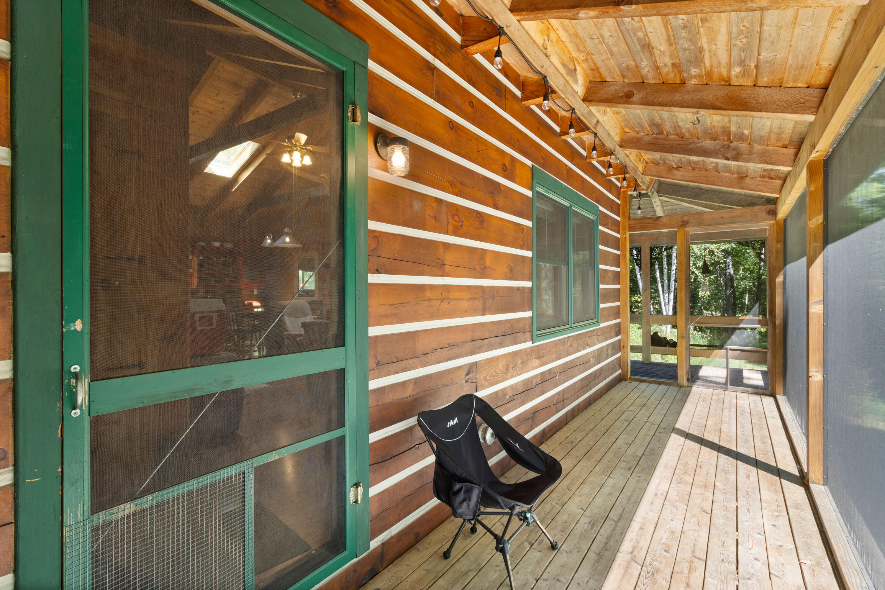 244 Buker Road Litchfield, ME 04350 - Photo 28 of 43 244 Buker Rd Screened Porch
