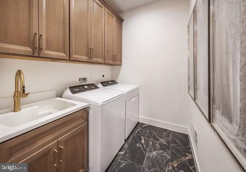 949 Swedesford Road, Unit 1 Exton, PA 19341 - Photo 15 of 19 Sleek laundry room with modern finishes.