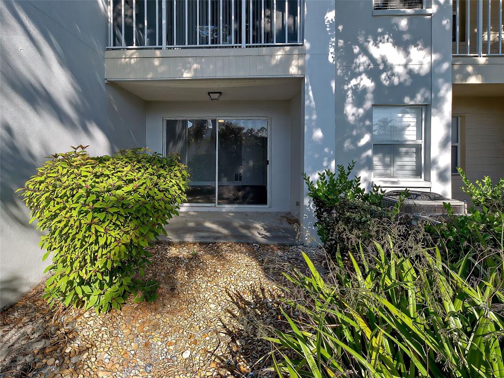 429 Cerromar Lane, Unit 352 Venice, FL 34293 - Photo 2 of 47 a front view of a house with a lots of yellow lighting