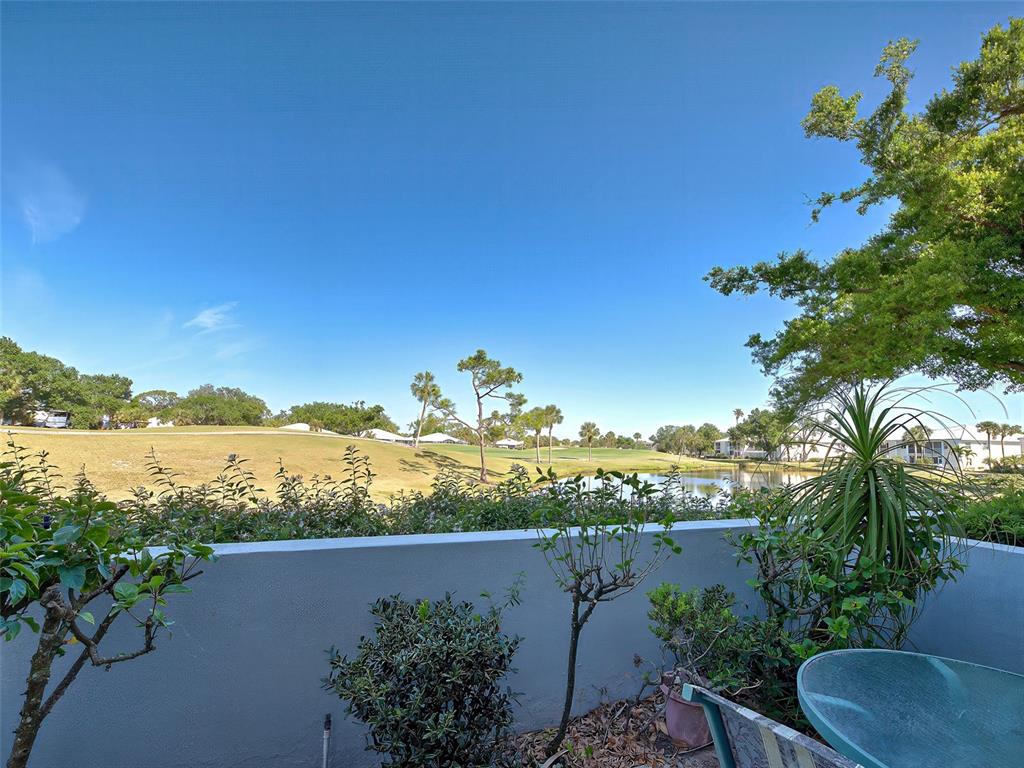 429 Cerromar Lane, Unit 352 Venice, FL 34293 - Photo 36 of 47 a view of a lake with a city