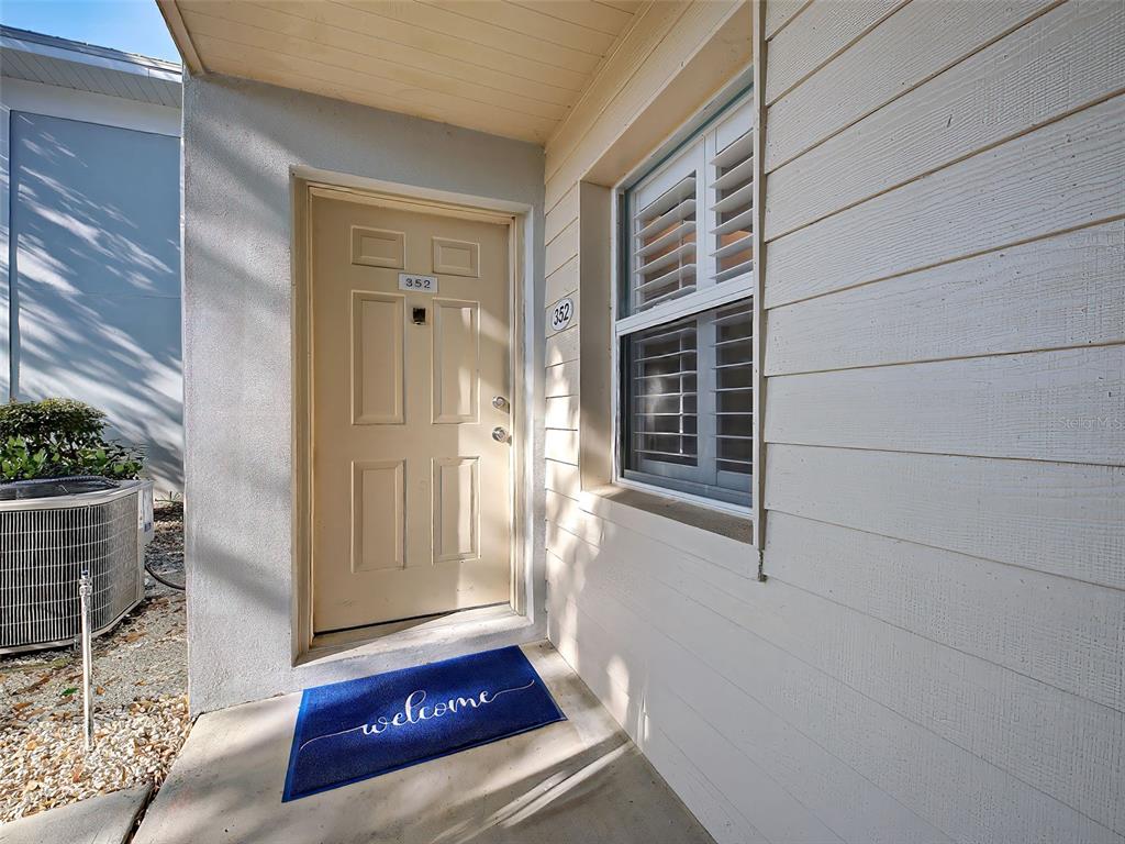 429 Cerromar Lane, Unit 352 Venice, FL 34293 - Photo 4 of 47 a view of front door of a house