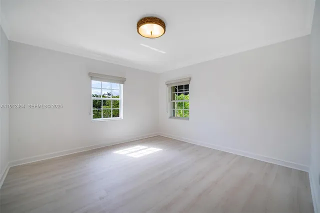 a bathroom with a sink and vanity