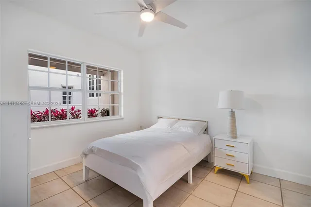 a en suite bathroom with a sink and a mirror
