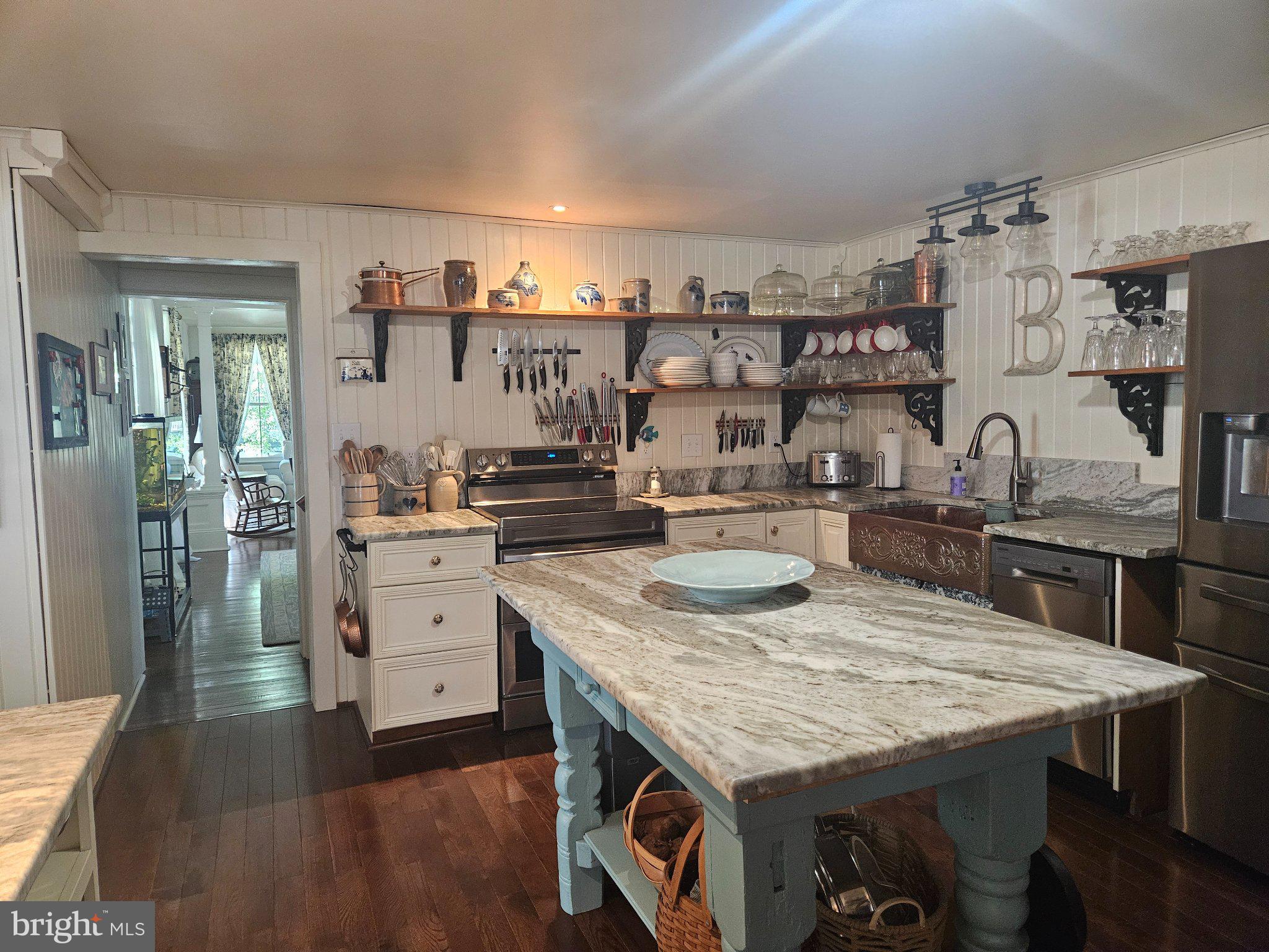 202 Central Avenue Ridgely, MD 21660 - Photo 11 of 22 Charming kitchen with rustic elegance.