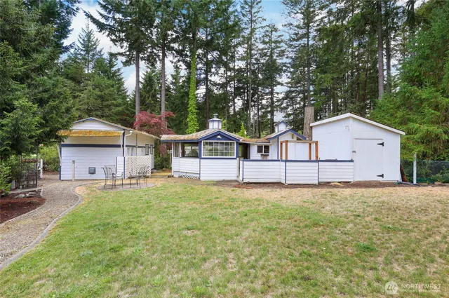 a house with trees in front of it