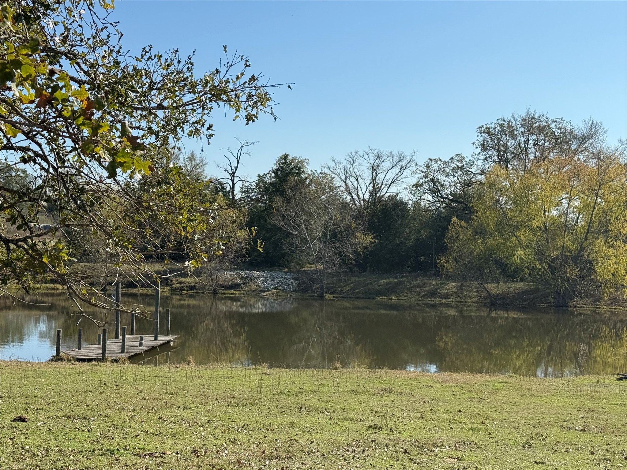 7538 Rocky Ridge Lane Madisonville, TX 77864 - Photo 11 of 48 a view of lake with trees