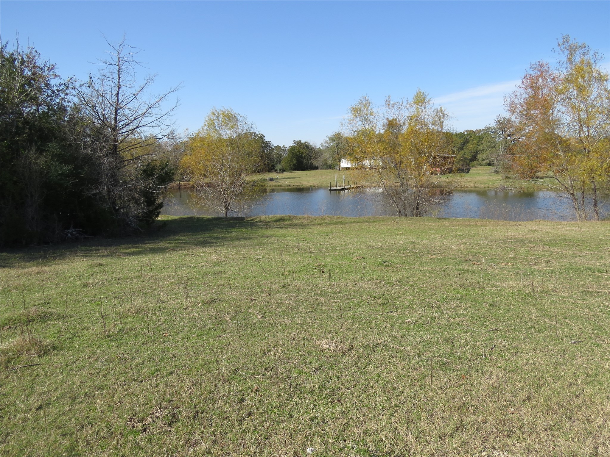 7538 Rocky Ridge Lane Madisonville, TX 77864 - Photo 3 of 48 a view of a lake view