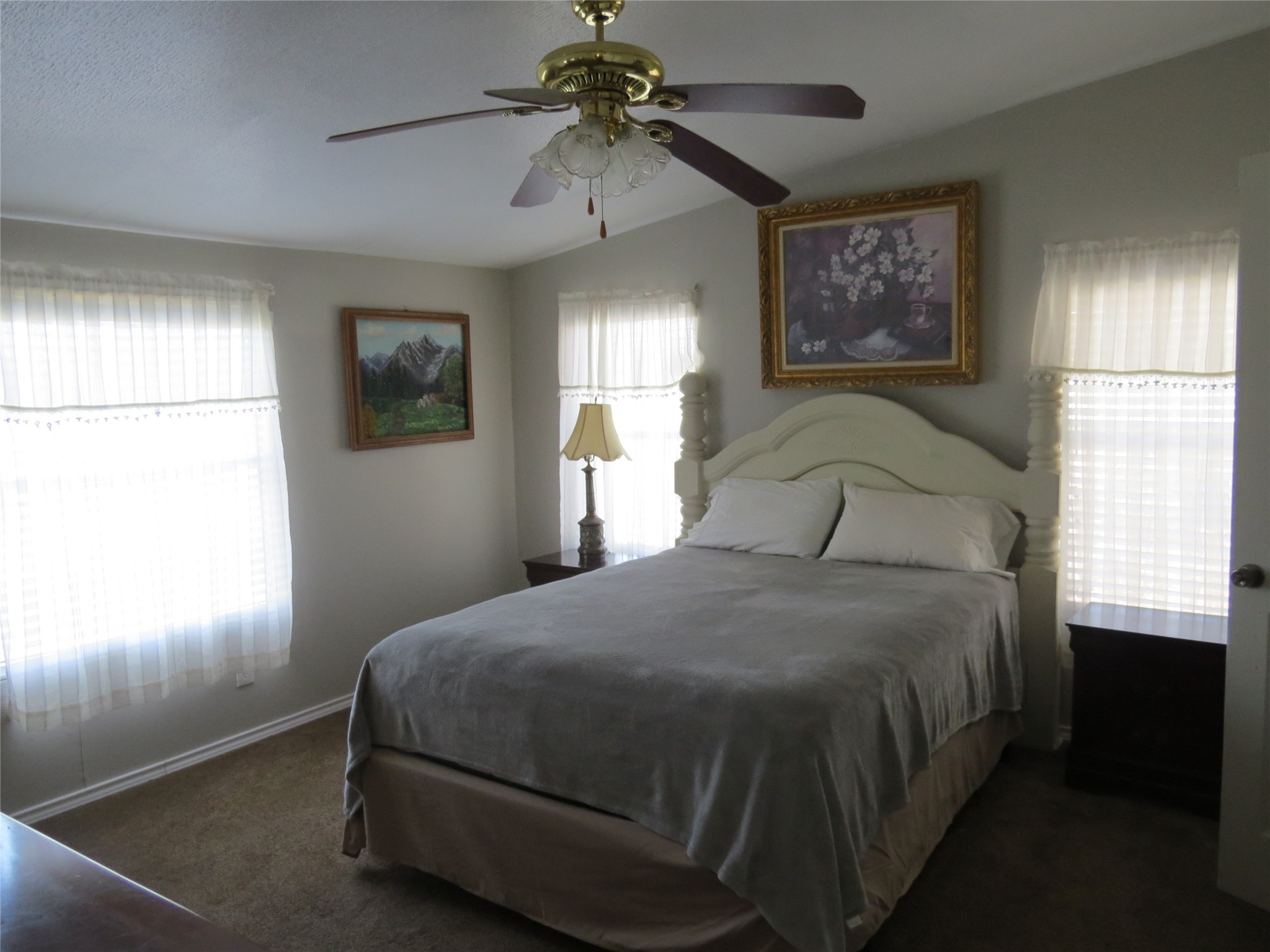 7538 Rocky Ridge Lane Madisonville, TX 77864 - Photo 46 of 48 a bedroom with a bed and a window