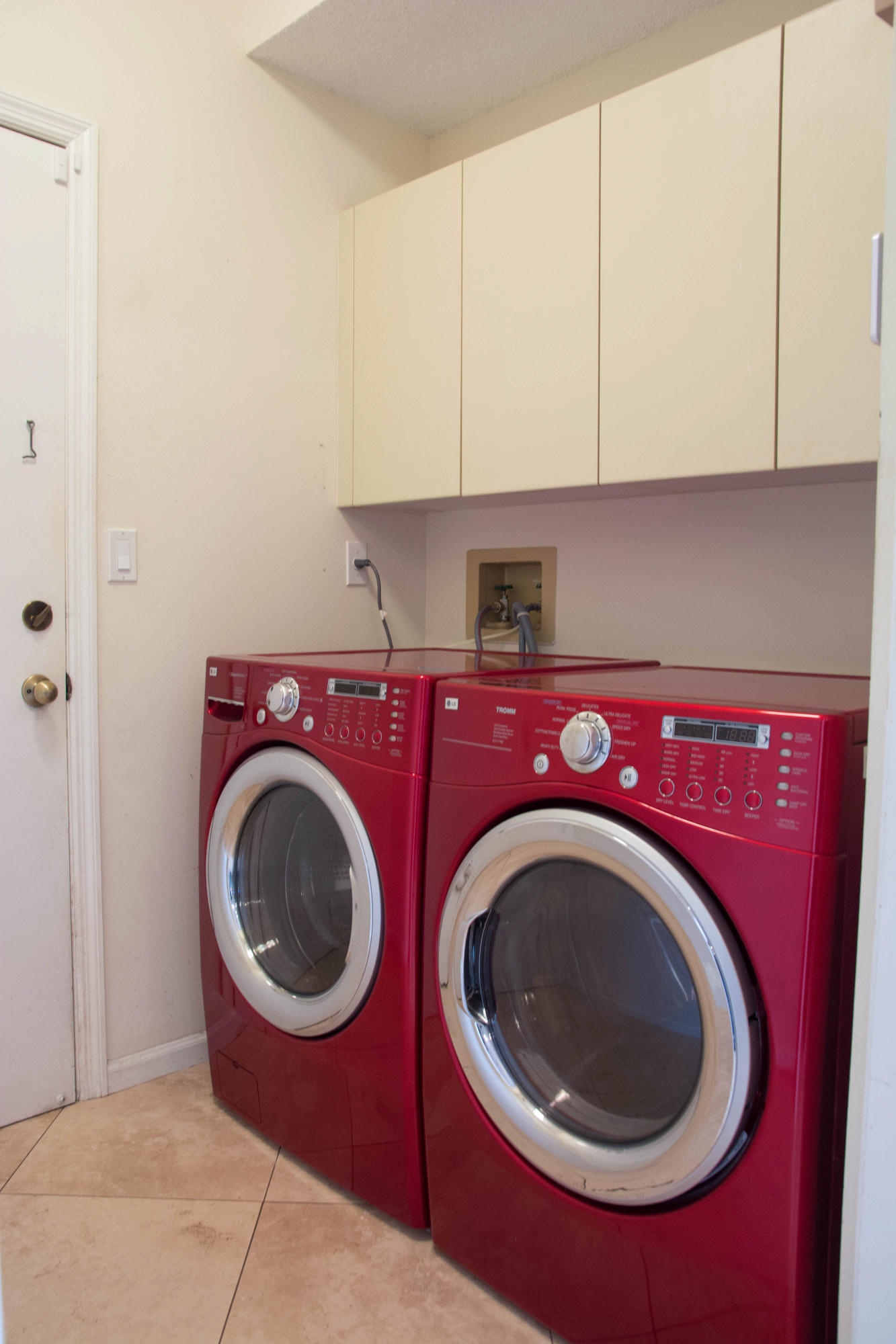 21722 Cromwell Circle Boca Raton, FL 33486 - Photo 22 of 23 21722 LAUNDRY ROOM WITH GARAGE ACCESS