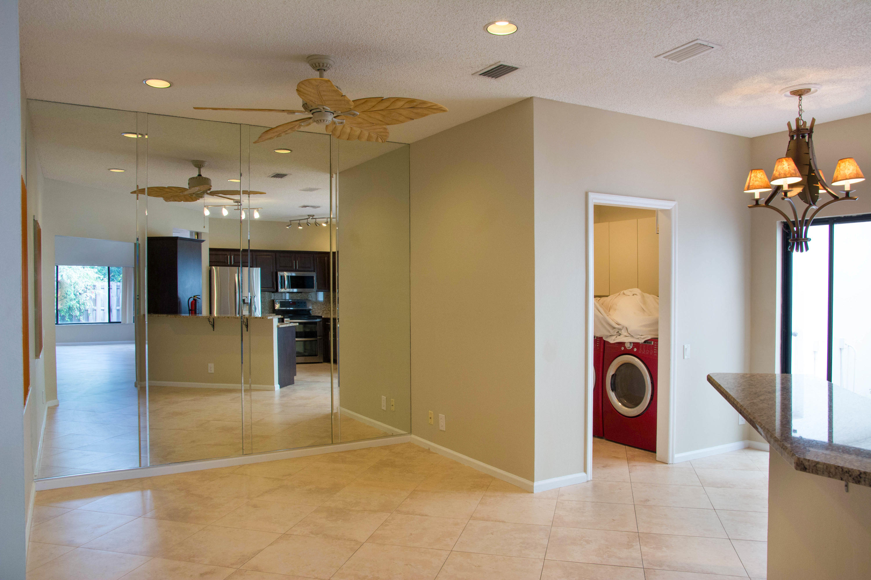 21722 Cromwell Circle Boca Raton, FL 33486 - Photo 7 of 23 21722 EAT IN KITCHEN AND LAUNDRY ROOM