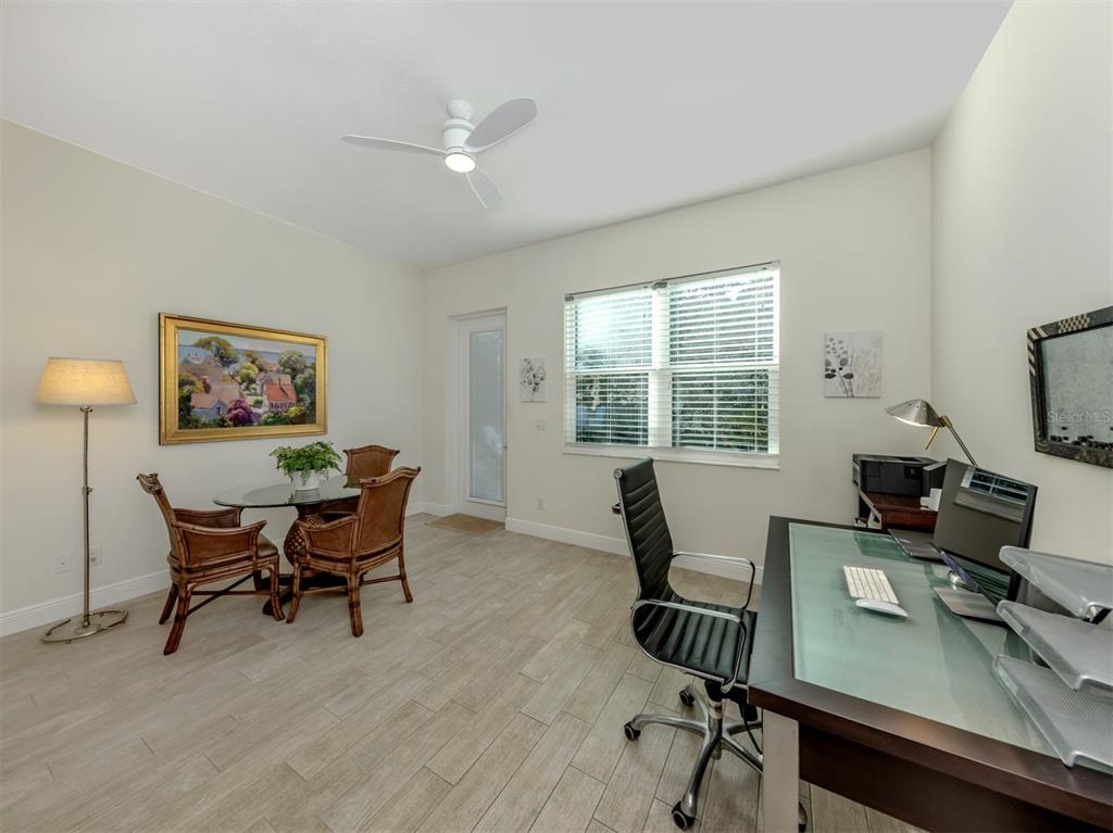 332 Pensacola Road Venice, FL 34285 - Photo 22 of 56 a workspace with furniture and a window